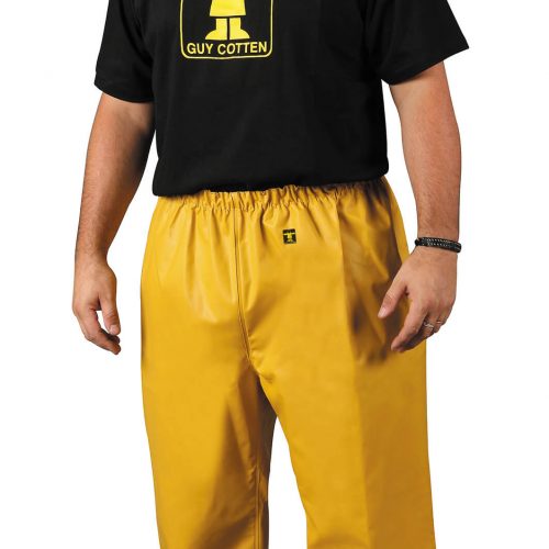 man wearing Guy Cotten heavy duty pouldo pants yellow