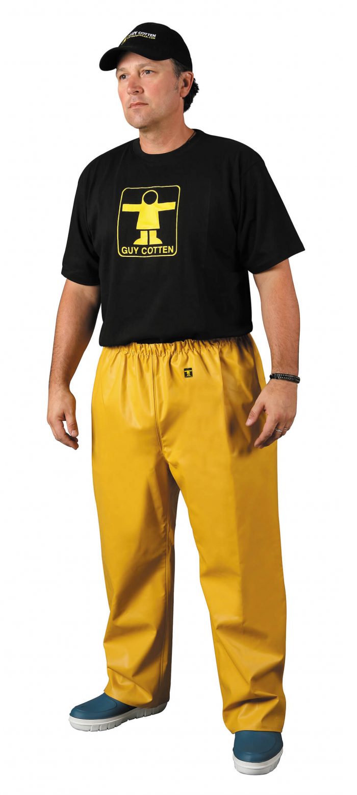 man wearing Guy Cotten heavy duty pouldo pants yellow